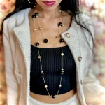 collana lunga dorata con sfere