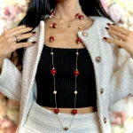 collana lunga dorata con sfere