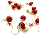 Collana lunga dorata con sfere